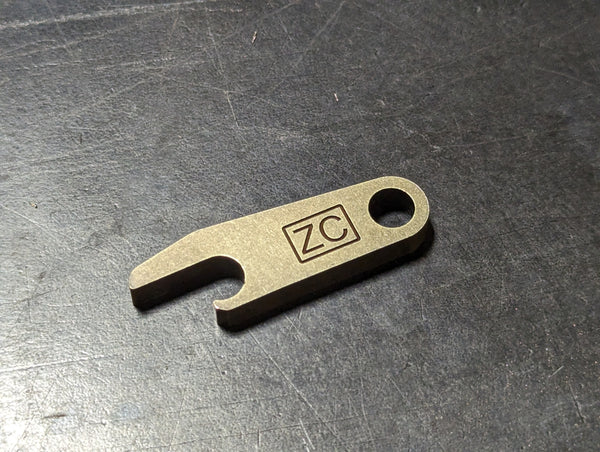 The Hooker Bottle Opener