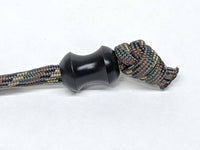 Version 2 Medium Curvy Delrin Lanyard Bead and a Free Paracord Lanyard