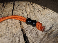 Version 2 Medium Curvy Delrin Lanyard Bead and a Free Paracord Lanyard