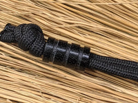 Medium Black Micarta Lanyard Bead With Three Grooves and a Free Paracord Lanyard