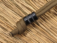 Medium Black Micarta Lanyard Bead With Two Grooves and a Free Paracord Lanyard