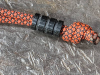 Medium Black Micarta Lanyard Bead With Three Grooves and a Free Paracord Lanyard