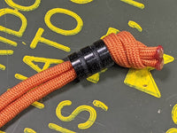 Medium Black Micarta Lanyard Bead With Two Grooves and a Free Paracord Lanyard