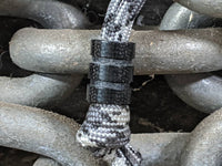 Medium Black Micarta Lanyard Bead With Two Grooves and a Free Paracord Lanyard