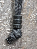 Medium Black Micarta Lanyard Bead With Two Grooves and a Free Paracord Lanyard