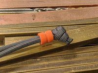 Medium Orange G10 Lanyard Bead With One Groove and a Free Paracord Lanyard