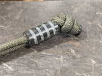 Medium Black Micarta Lanyard Bead With 4 Grooves and a Free Paracord Lanyard
