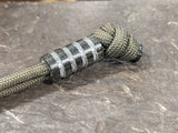 Medium Black Micarta Lanyard Bead With 4 Grooves and a Free Paracord Lanyard
