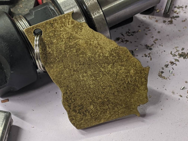 Brass State of Georgia key chain with Patina