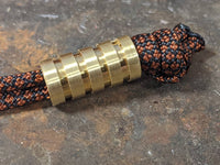 Medium Brass Lanyard Bead With Four Grooves and a Free Paracord Lanyard
