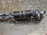 Wide Edge Medium Black Micarta Bead With 2 Grooves and a Free Paracord Lanyard