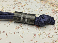 Wide Edge Medium Black Micarta Bead With 2 Grooves and a Free Paracord Lanyard