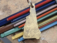 Brass State of New Hampshire key chain with Patina