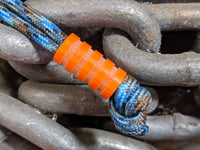 Medium Orange G10 Lanyard Bead With Four Grooves and a Free Paracord Lanyard