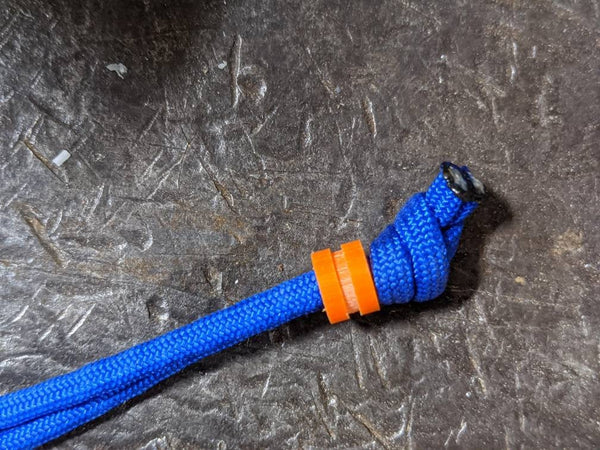 Small Orange G10 Lanyard Bead and a Free Paracord Lanyard