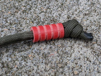 Medium Red G10 Lanyard Bead With Four Grooves and a Free Paracord Lanyard