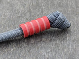 Medium Red G10 Lanyard Bead With Four Grooves and a Free Paracord Lanyard